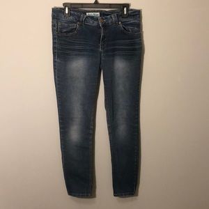 Faded dark blue jeans